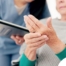 A caregiver provides in home care services to a senior with arthritis