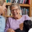 Through dementia care at home, a caregiver provides support to a senior.