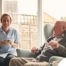 A caregiver provides Memory Care at Home to a senior